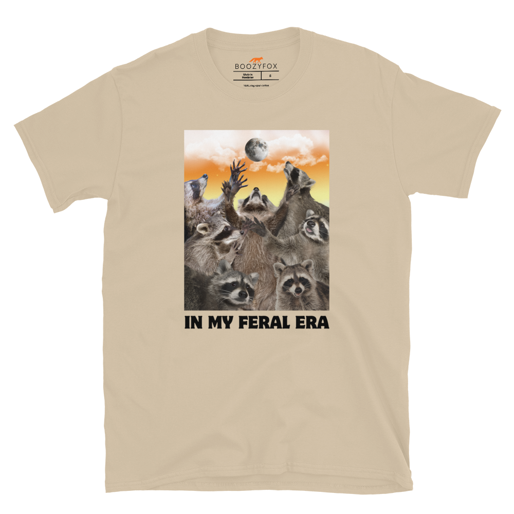Funny In My Feral Era Raccoon graphic t-shirt in sand by Boozy Fox