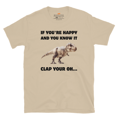 Funny Tyrannosaurus Rex If You're Happy And You Know It Clap Your Oh... Dinosaur graphic t-shirt in sand by Boozy Fox