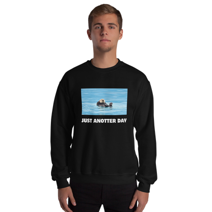 Man wearing a black Just Anotter Day Otter Sweatshirt - Boozy Fox