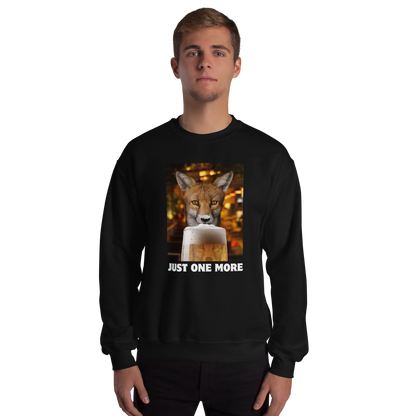 Man wearing a Funny Just One More Fox graphic sweatshirt in black by Boozy Fox