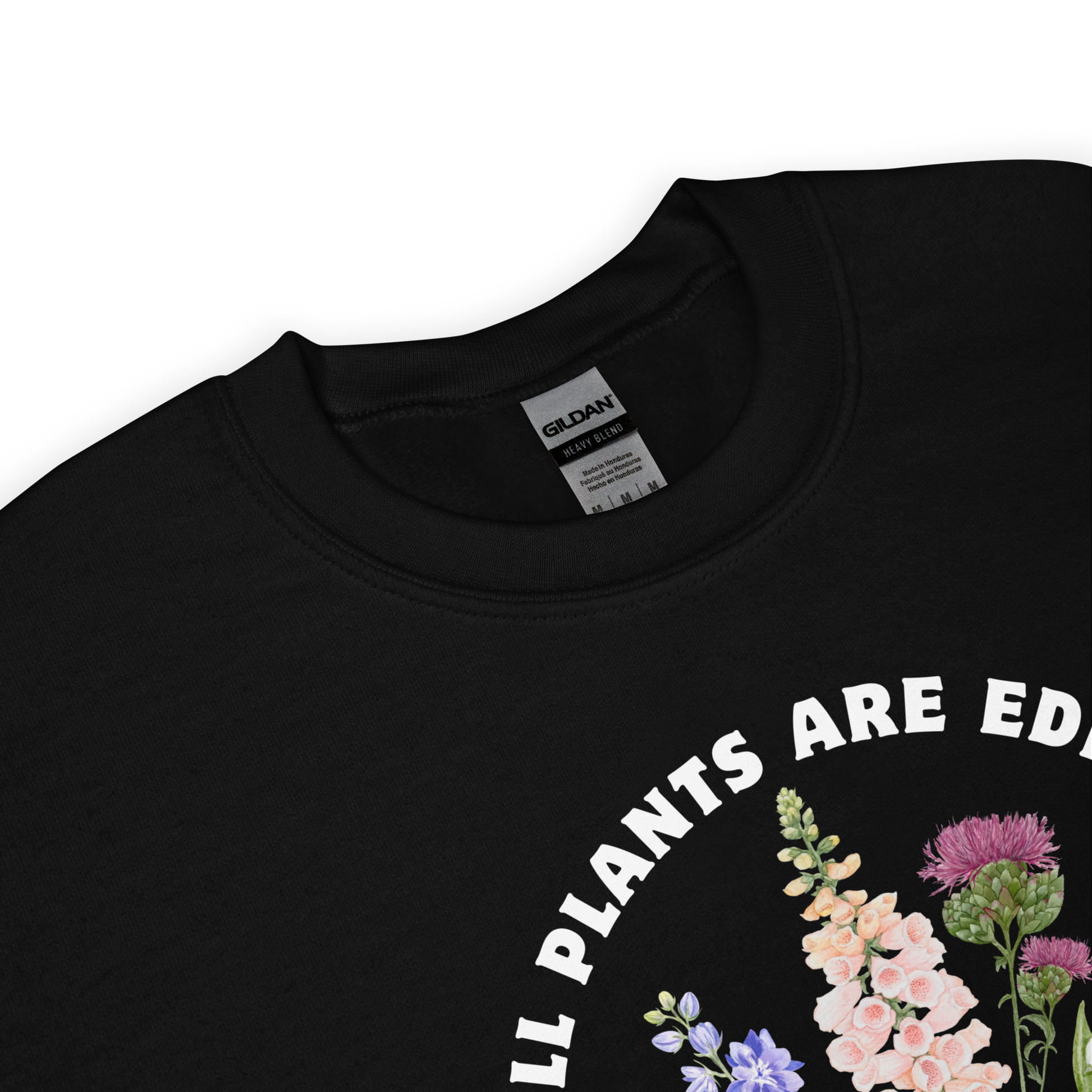 Front details of a Funny All Plants Are Edible Some Only Once Plant graphic sweatshirt in black by Boozy Fox