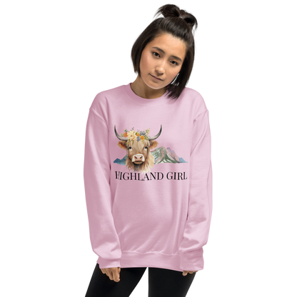 Woman wearing a Light Pink Highland Cow Sweatshirt featuring an adorable Highland Girl graphic on the chest - Cute Graphic Highland Cow Sweatshirts - Boozy Fox