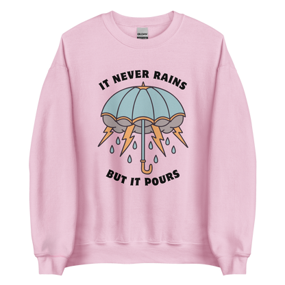 Light Pink Umbrella Sweatshirt featuring a unique It Never Rains But It Pours graphic on the chest - Cool Tattoo-Inspired Graphic Umbrella Sweatshirts - Boozy Fox