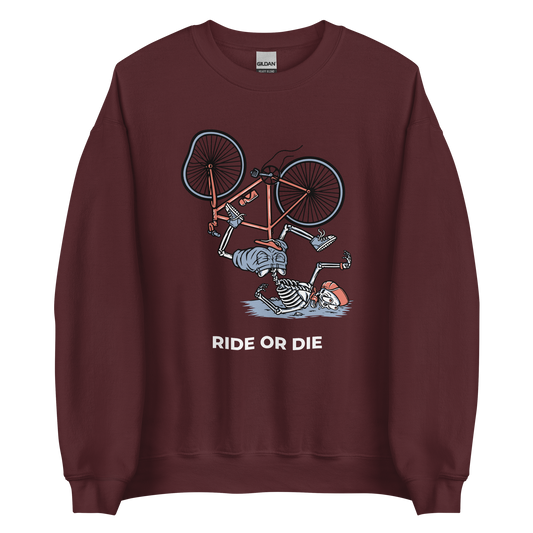 Maroon Ride or Die Sweatshirt featuring a bold Skeleton Falling While Riding a Bicycle graphic on the chest - Funny Graphic Skeleton Sweatshirts - Boozy Fox