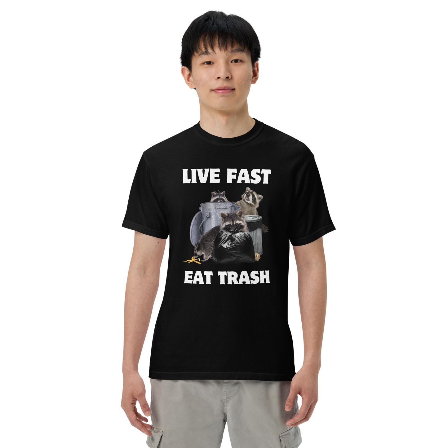 Man wearing a black Live Fast, Eat Trash Raccoon Heavyweight T-Shirt - Boozy Fox