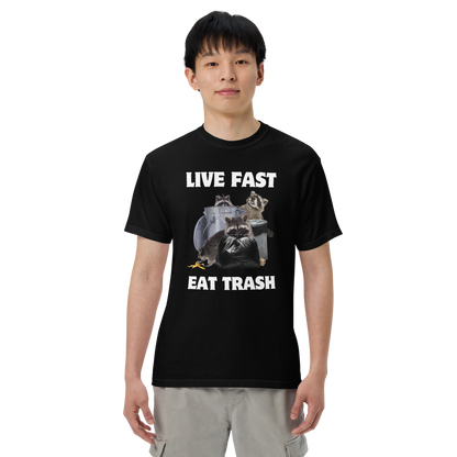 Man wearing a black Live Fast, Eat Trash Raccoon Heavyweight T-Shirt - Boozy Fox