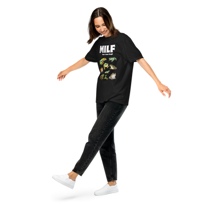 Woman wearing a black Man I Love Frogs Heavyweight T-Shirt - Boozy Fox