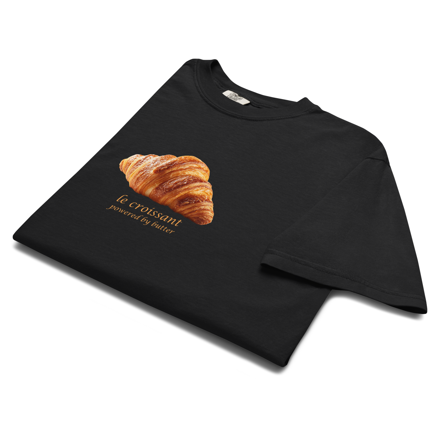 Product details of a Funny Le Croissant heavyweight graphic t-shirt in black by Boozy Fox