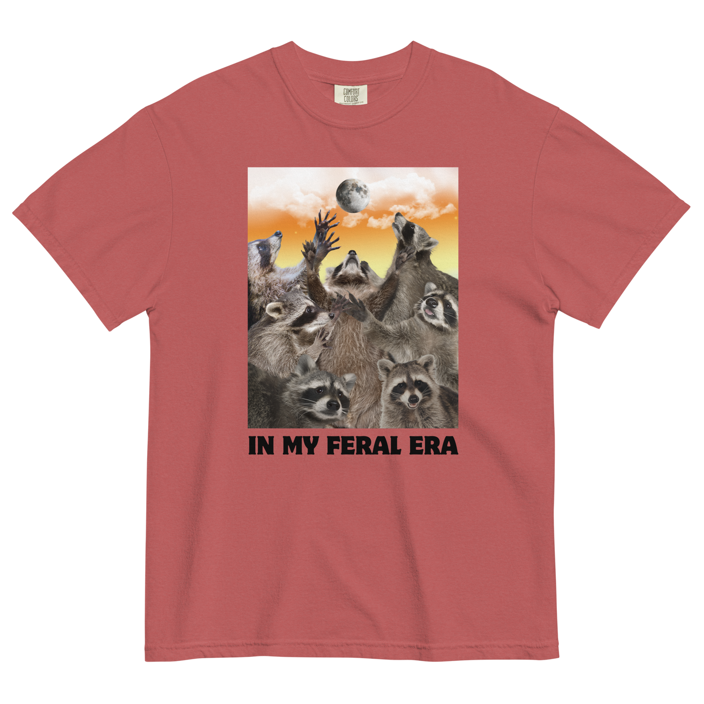Funny In My Feral Era Raccoon heavyweight graphic t-shirt in crimson red by Boozy Fox