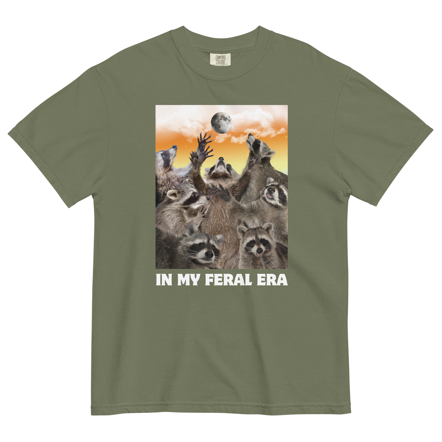 Funny In My Feral Era Raccoon heavyweight graphic t-shirt in moss green by Boozy Fox