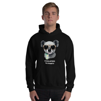 Man wearing a Black Koala Hoodie featuring a captivating Koalafied To Party graphic on the chest - Funny Graphic Koala Hoodies - Boozy Fox