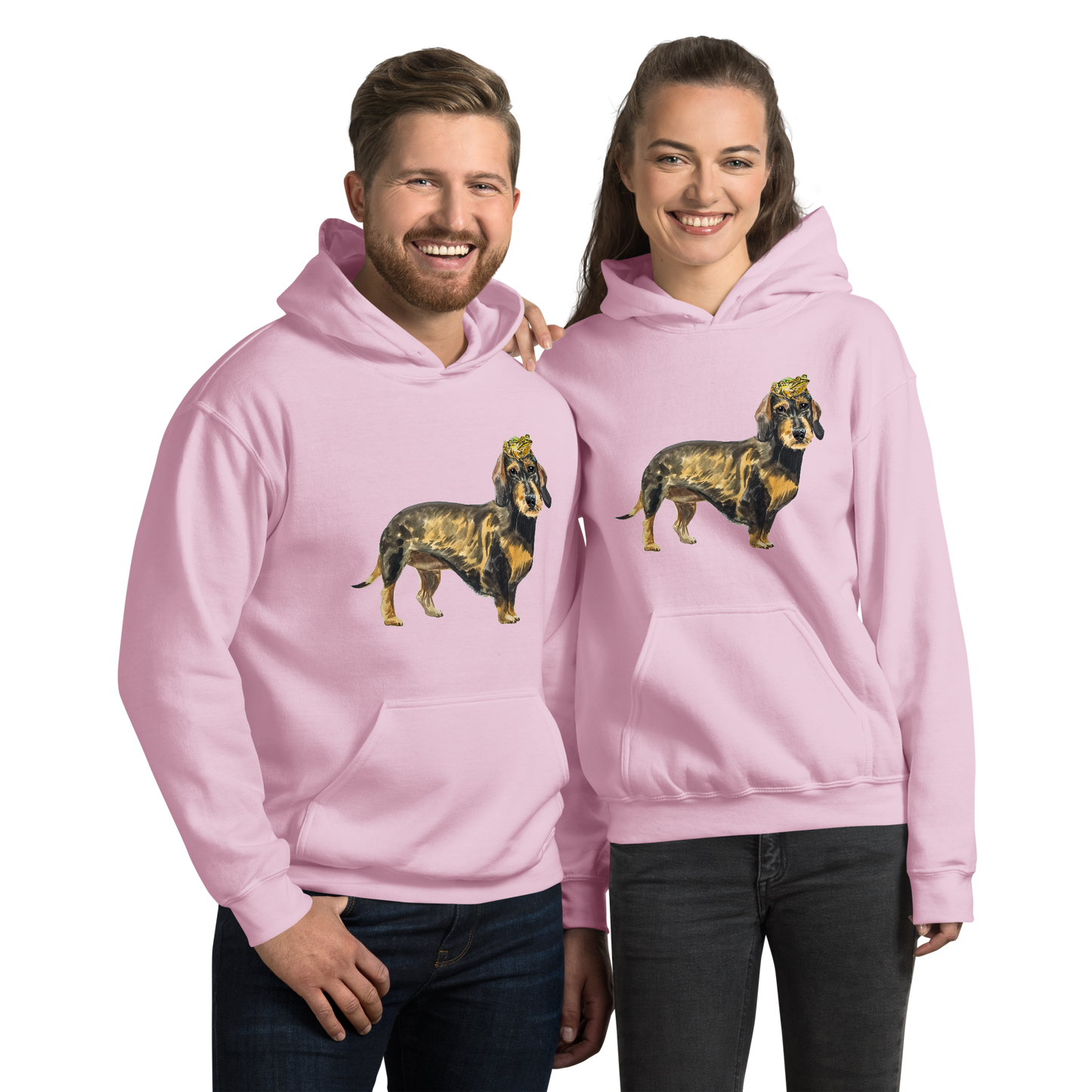 Smiling man and woman wearing a Light Pink Dachshund Hoodie featuring an adorable Frog on a Dachshund's Head graphic on the chest - Cute Graphic Dachshund Hoodies - Boozy Fox