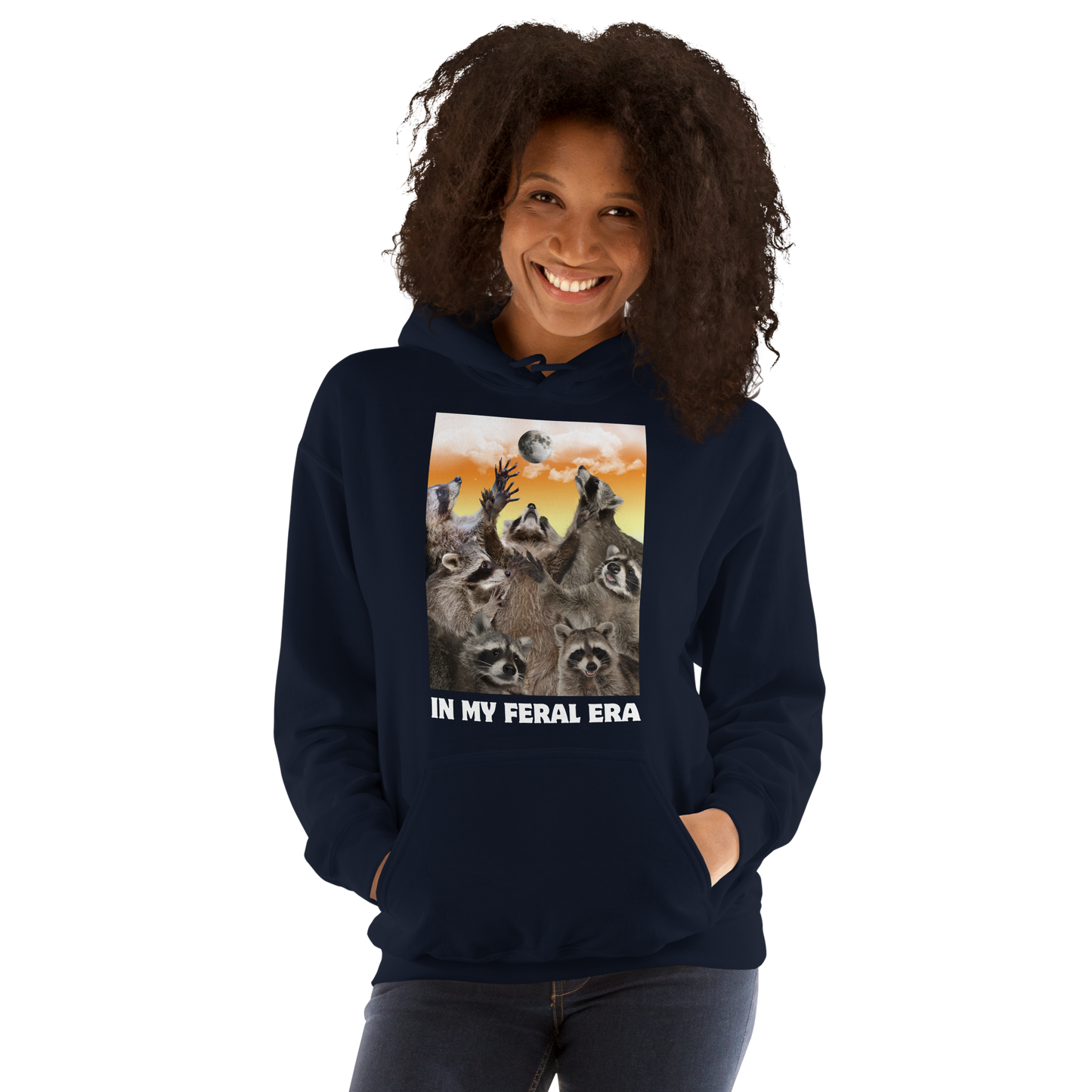 Woman wearing a Funny In My Feral Era Raccoon graphic hoodie in navy by Boozy Fox