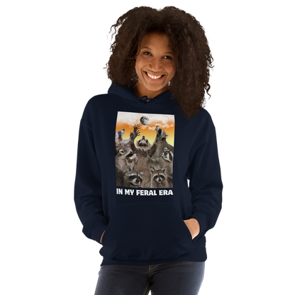 Woman wearing a Funny In My Feral Era Raccoon graphic hoodie in navy by Boozy Fox