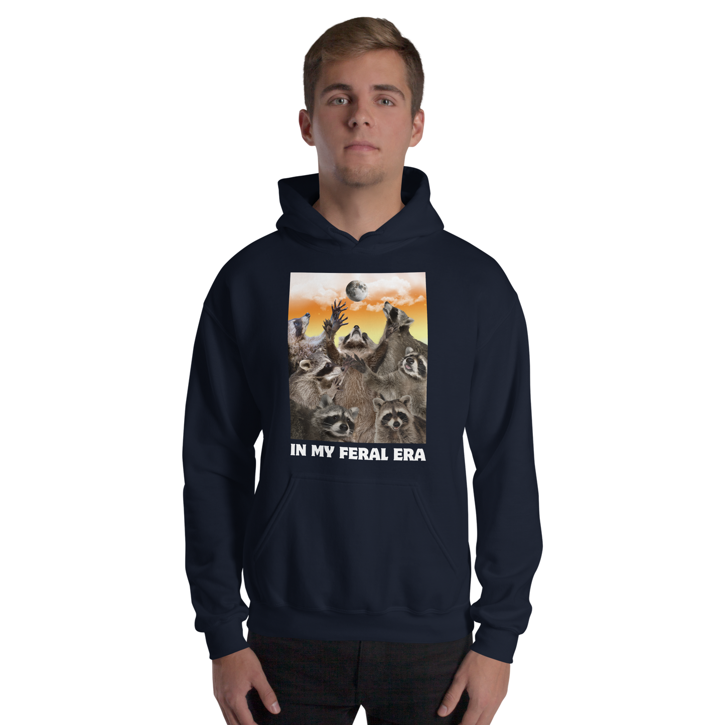 Man wearing a Funny In My Feral Era Raccoon graphic hoodie in navy by Boozy Fox