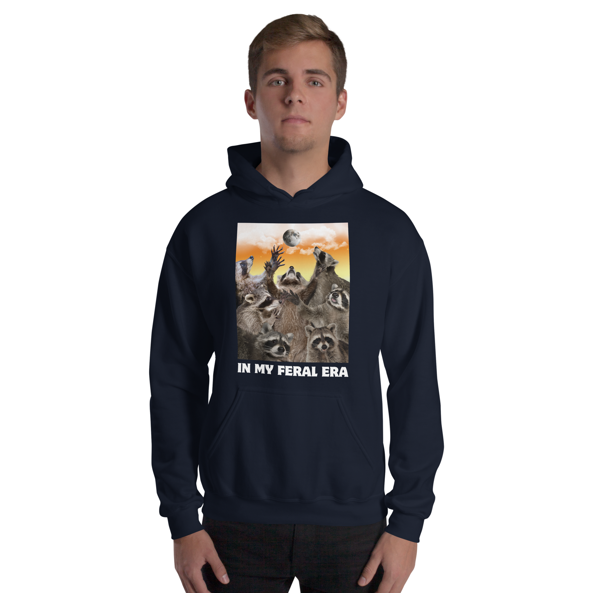 Man wearing a Funny In My Feral Era Raccoon graphic hoodie in navy by Boozy Fox