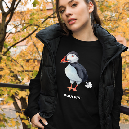 Woman wearing a Black Puffin Long Sleeve Tee featuring a comic Puuffin' graphic on the chest - Funny Puffin Long Sleeve Graphic Tees - Boozy Fox