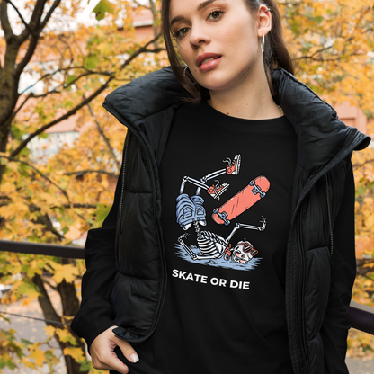 Woman wearing a Black Skate or Die Long Sleeve Tee featuring a daring Skeleton Falling While Skateboarding graphic on the chest - Cool Skeleton Long Sleeve Graphic Tees - Boozy Fox