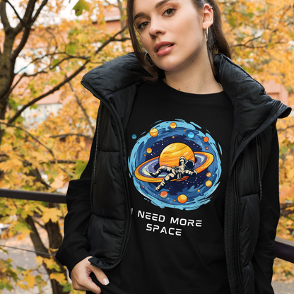 Woman wearing a Black Astronaut Long Sleeve Tee featuring a captivating I Need More Space graphic on the chest - Funny Space Long Sleeve Graphic Tees - Boozy Fox