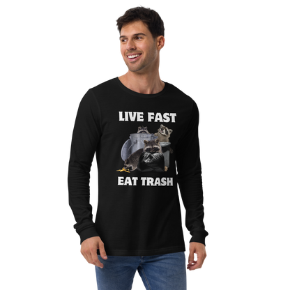Smiling man wearing a Black Raccoon Long Sleeve Tee featuring a funny Live Fast Eat Trash graphic on the chest - Funny Raccoon Long Sleeve Graphic Tees - Boozy Fox