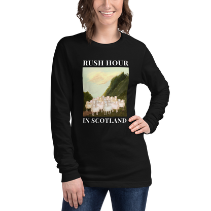 Woman wearing a Black Sheep Long Sleeve Tee featuring a comical Rush Hour In Scotland graphic on the chest - Artsy/Funny Sheep Long Sleeve Graphic Tees - Boozy Fox
