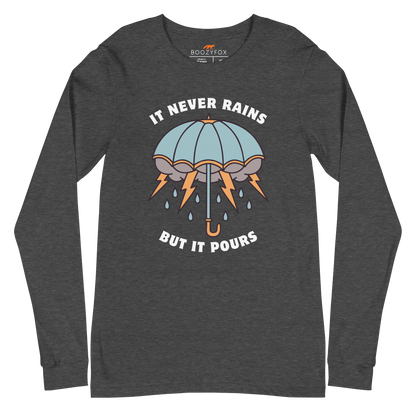 Dark Grey Heather Umbrella Long Sleeve Tee featuring a unique It Never Rains But It Pours graphic on the chest - Cool Tattoo-Inspired Umbrella Long Sleeve Graphic Tees - Boozy Fox