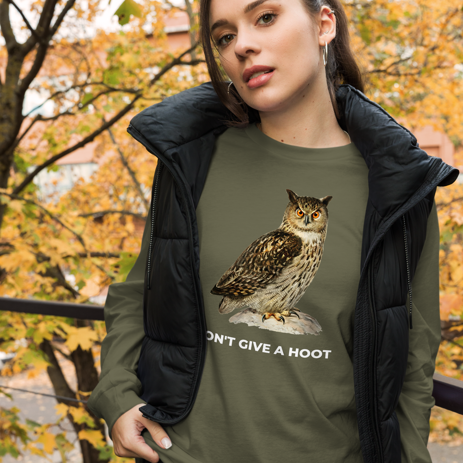 Woman wearing a Military Green Owl Long Sleeve Tee featuring a captivating Don't Give A Hoot graphic on the chest - Funny Owl Long Sleeve Graphic Tees - Boozy Fox