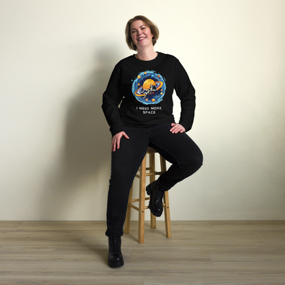 Smiling woman wearing a Black Organic Cotton Astronaut Sweatshirt featuring a captivating I Need More Space graphic on the chest - Funny Graphic Space Sweatshirts - Boozy Fox