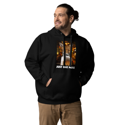 Man wearing a Funny Just One More Fox premium graphic hoodie in black by Boozy Fox