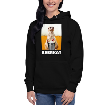 Woman wearing a Funny Meerkat Beer premium graphic hoodie in black by Boozy Fox