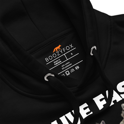 Product details of a funny Live Fast Eat Trash Raccoon premium graphic hoodie in black by Boozy Fox