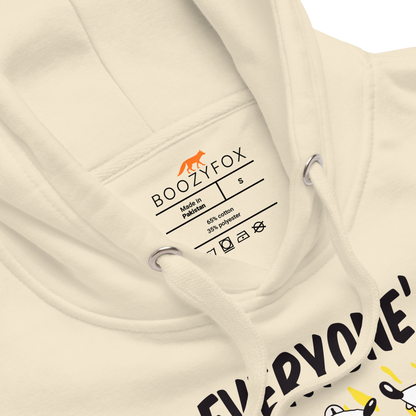 Product details of a Funny Everyone's A Little Crazy dog premium graphic hoodie in bone white by Boozy Fox