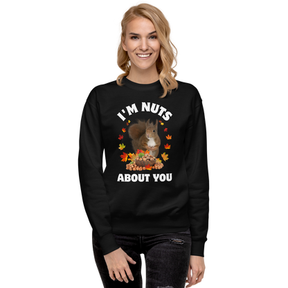 Smiling woman wearing a black I’m Nuts About You Squirrel Graphic Premium Sweatshirt - Boozy Fox