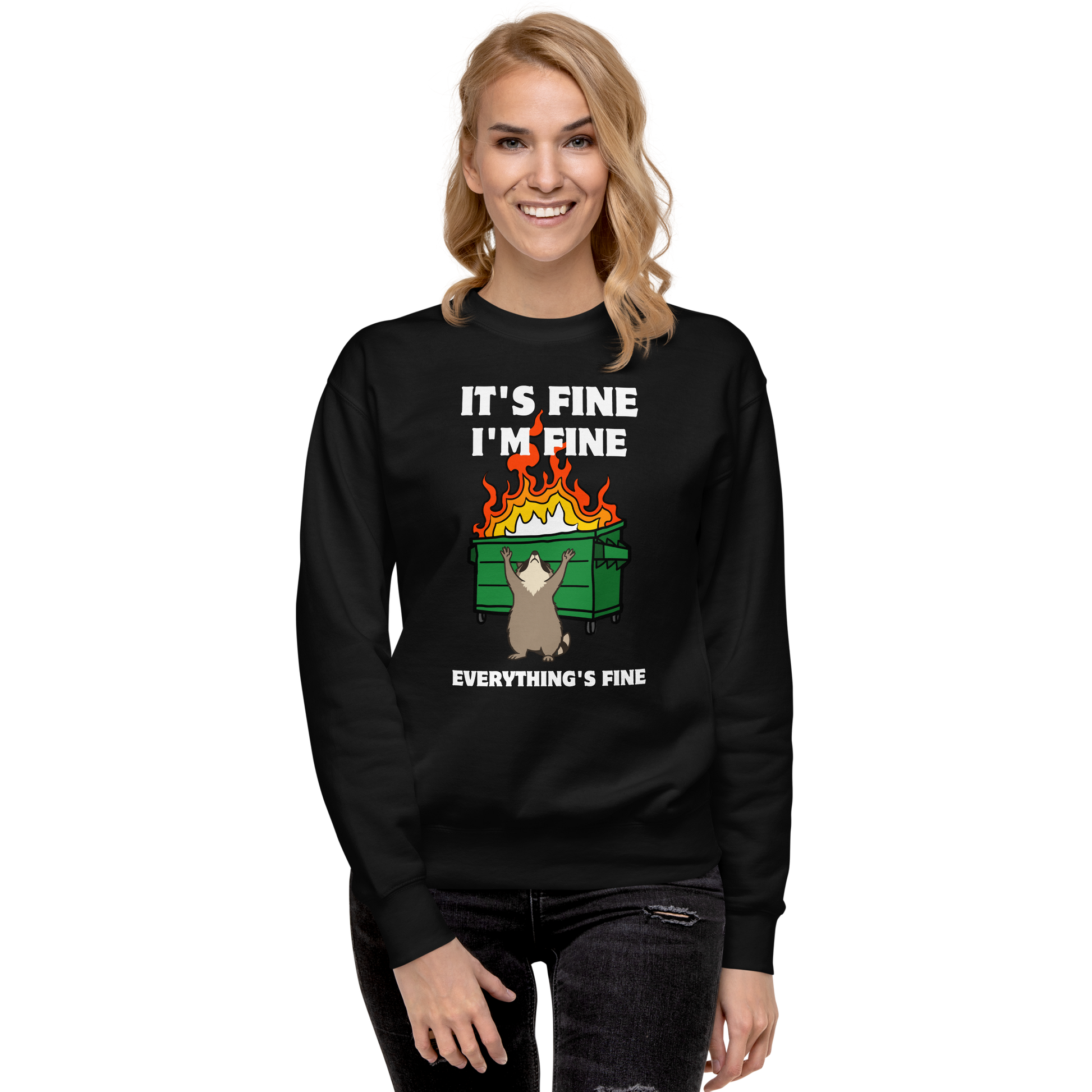 Woman wearing a Funny Dumpster Fire Raccoon premium graphic sweatshirt in black by Boozy Fox