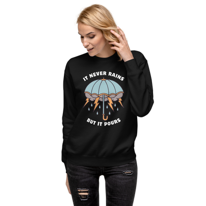 Woman wearing a Black It Never Rains But It Pours Graphic Premium Sweatshirt - Boozy Fox