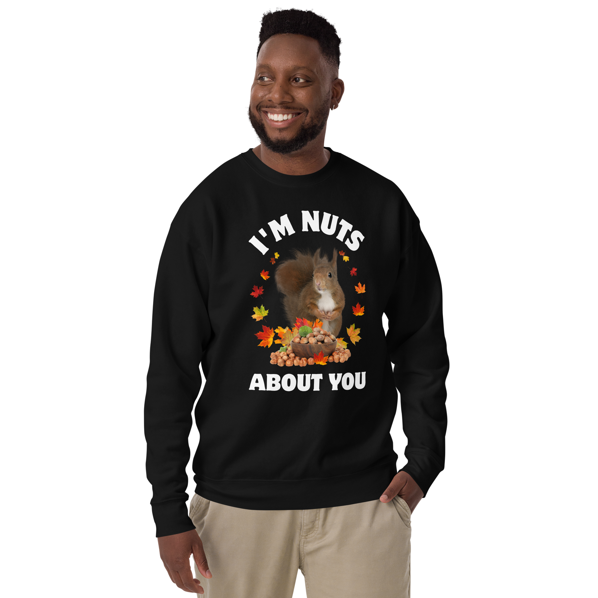 Smiling man wearing a black I’m Nuts About You Squirrel Graphic Premium Sweatshirt - Boozy Fox
