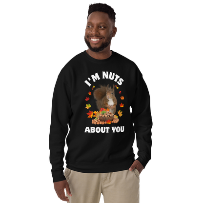 Smiling man wearing a black I’m Nuts About You Squirrel Graphic Premium Sweatshirt - Boozy Fox