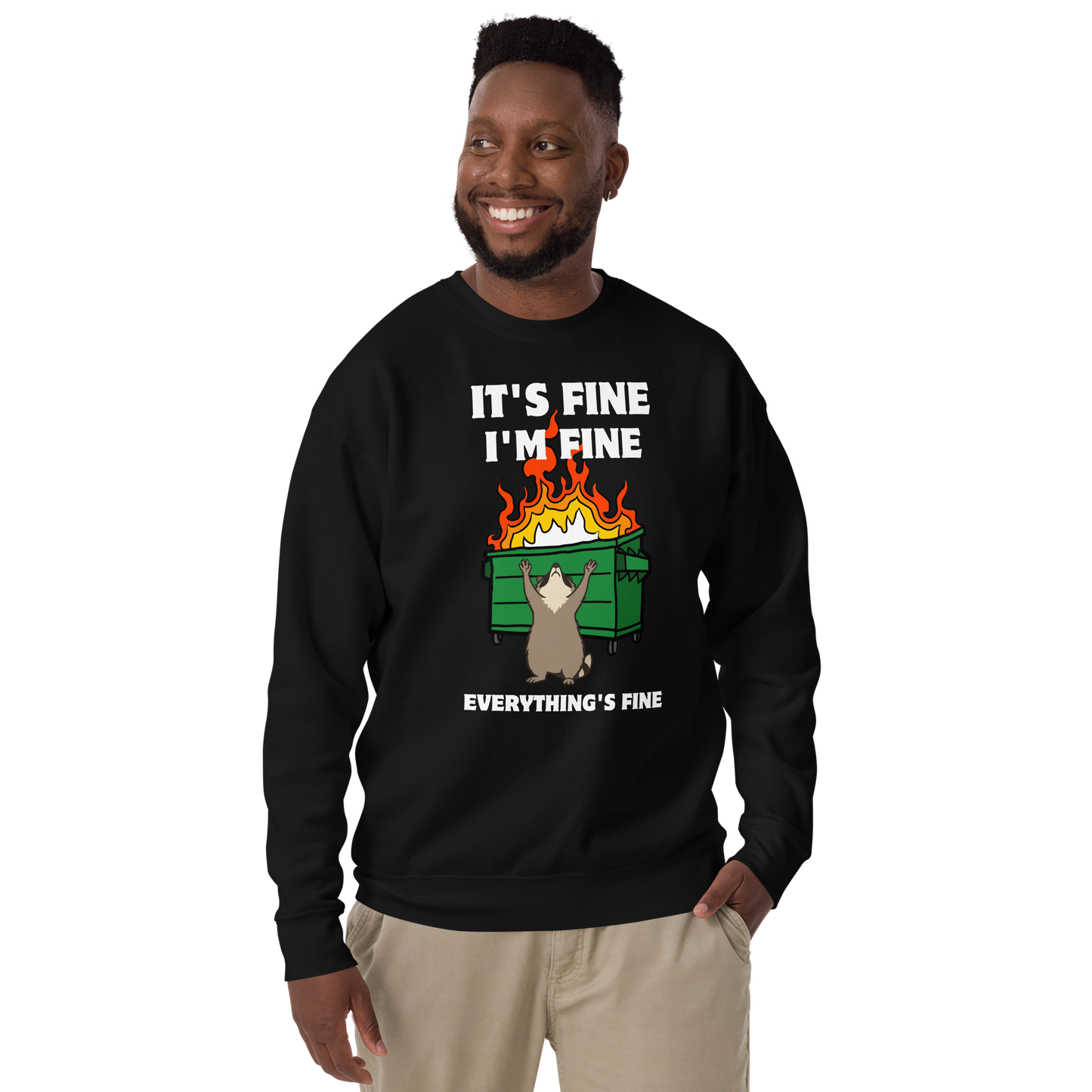 Man wearing a Funny Dumpster Fire Raccoon premium graphic sweatshirt in black by Boozy Fox