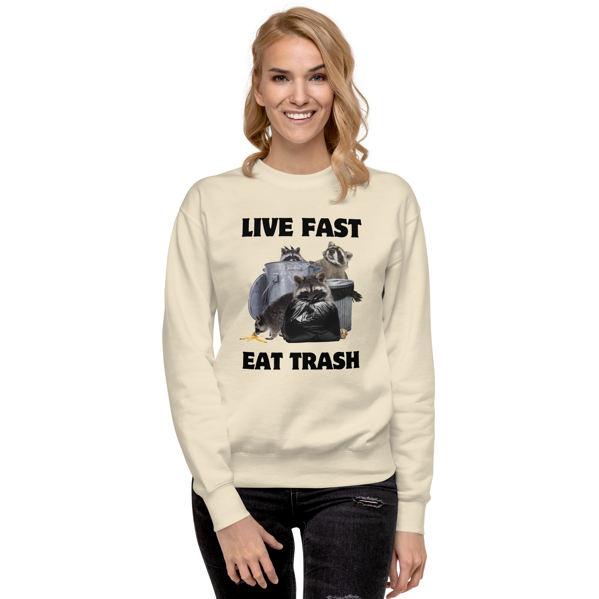 Smiling woman wearing a bone Live Fast, Eat Trash Raccoon Graphic Premium Sweatshirt - Boozy Fox