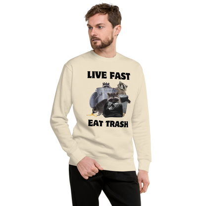Man wearing a bone Live Fast, Eat Trash Raccoon Graphic Premium Sweatshirt - Boozy Fox