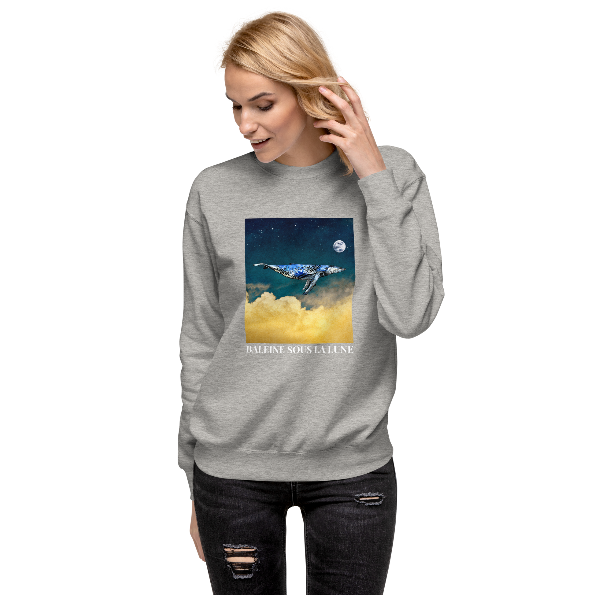 Woman wearing a Carbon Grey Premium Whale Sweatshirt featuring a majestic Whale Under The Moon graphic on the chest - Cool Graphic Whale Sweatshirts - Boozy Fox