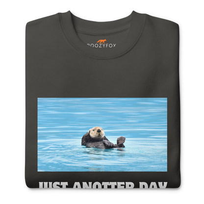Front details of a Vintage Black Just Anotter Day Otter Graphic Premium Sweatshirt - Boozy Fox