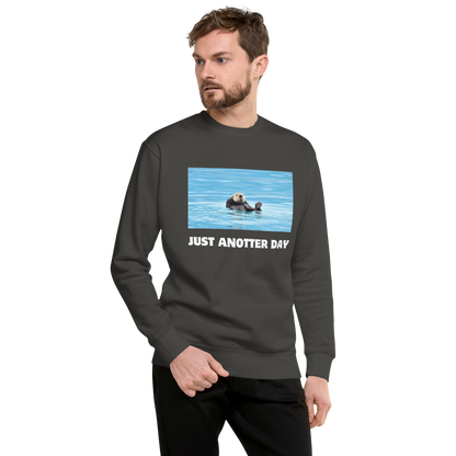 Man wearing a Vintage Black Just Anotter Day Otter Graphic Premium Sweatshirt - Boozy Fox