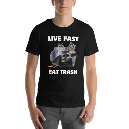 Man wearing a Black Premium Raccoon Tee featuring a funny 'Live Fast Eat Trash' graphic on the chest - Funny Graphic Raccoon Tees - Boozy Fox