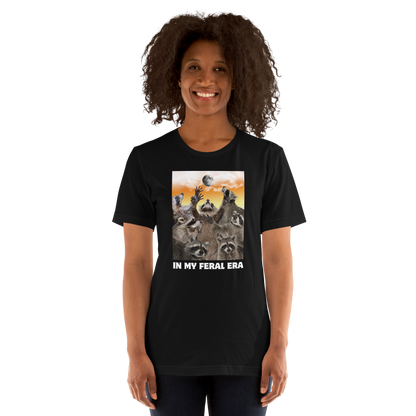 Woman wearing a Funny In My Feral Era Raccoon lightweight graphic t-shirt in black by Boozy Fox