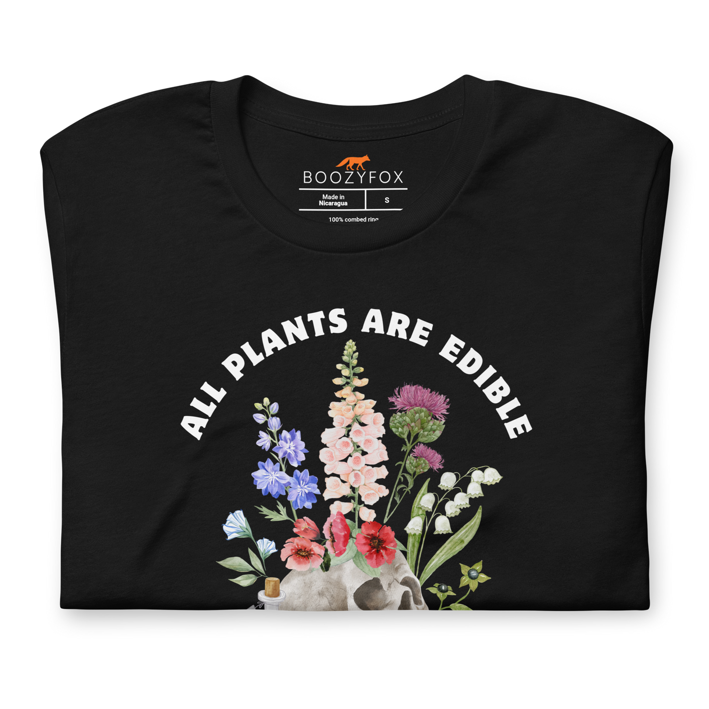 Front details of a Funny All Plants Are Edible Some Only Once Plant lightweight graphic t-shirt in black by Boozy Fox