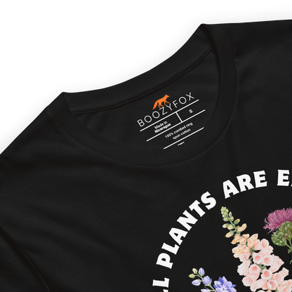 Product details of a Funny All Plants Are Edible Some Only Once Plant lightweight graphic t-shirt in black by Boozy Fox