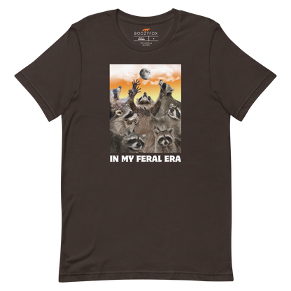 Funny In My Feral Era Raccoon lightweight graphic t-shirt in brown by Boozy Fox