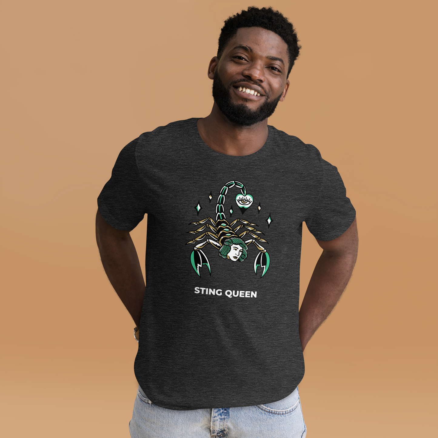 Smiling man wearing a Dark Grey Heather Premium Scorpion Tee featuring The Sting Queen graphic on the chest - Cool Graphic Scorpion Tees - Boozy Fox