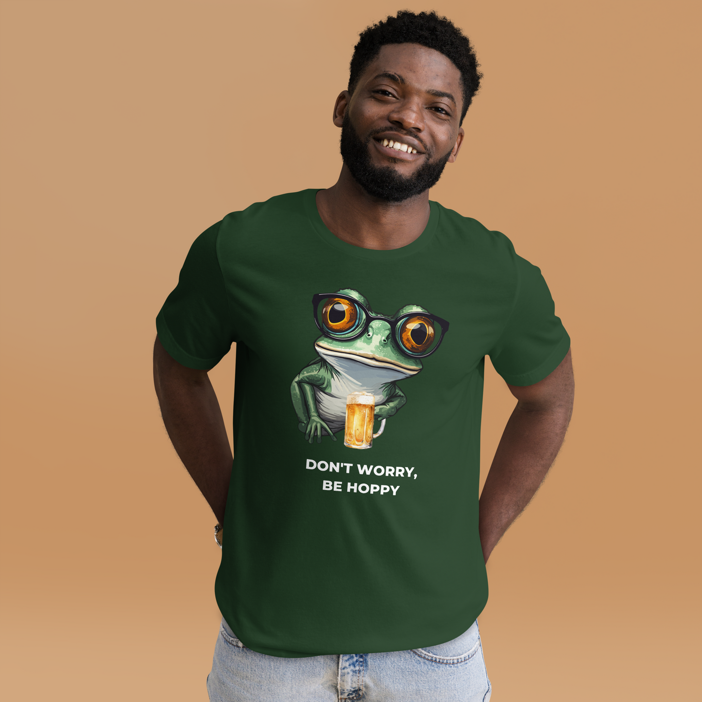 Smiling man wearing a Forest Green Premium Frog Tee featuring a funny Don't Worry, Be Hoppy graphic on the chest - Funny Graphic Frog Tees - Boozy Fox